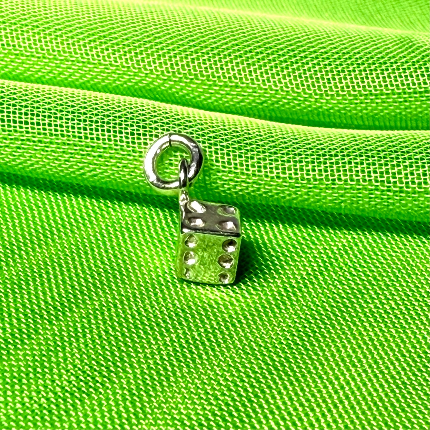 Small dice shaped sterling silver charm