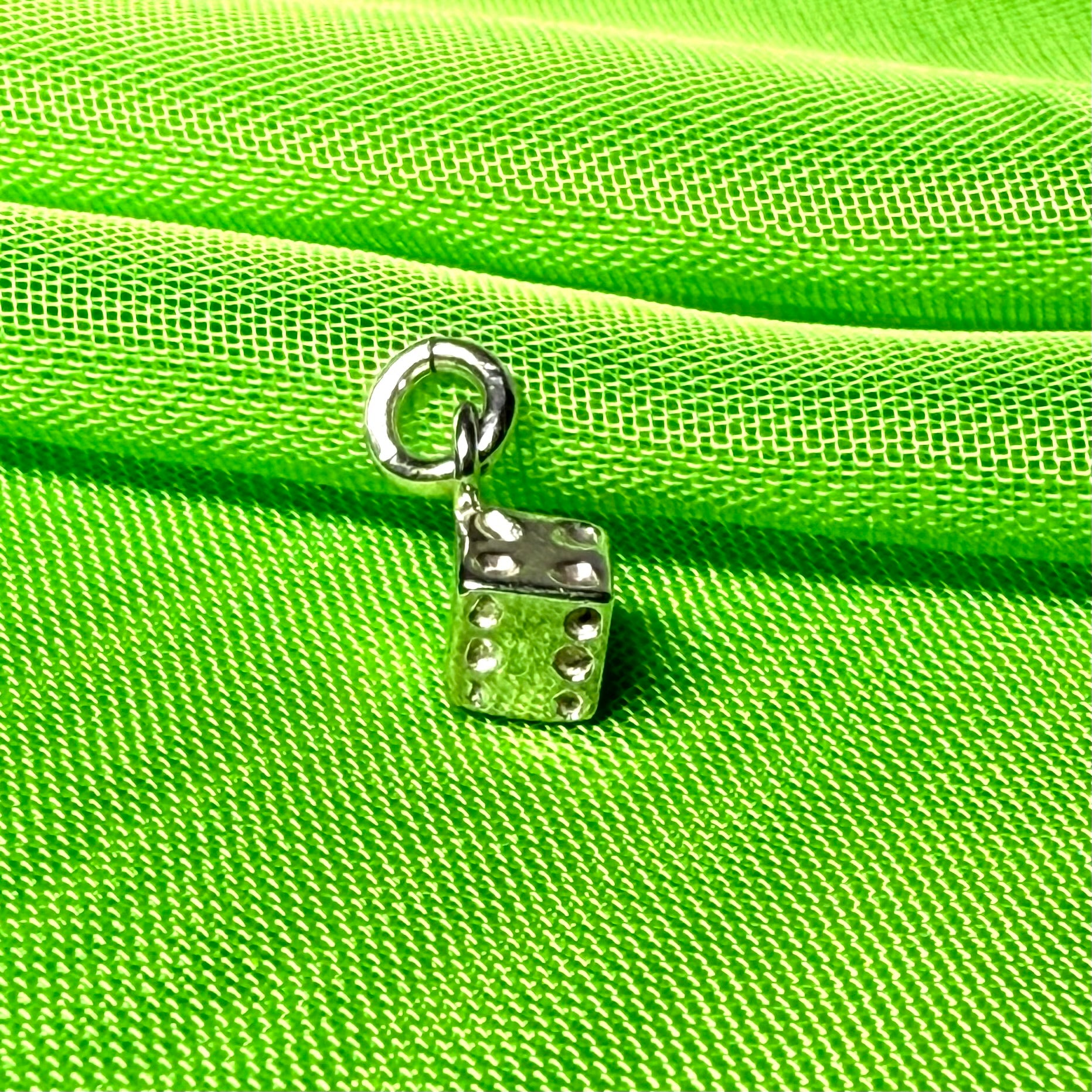 Small dice shaped sterling silver charm