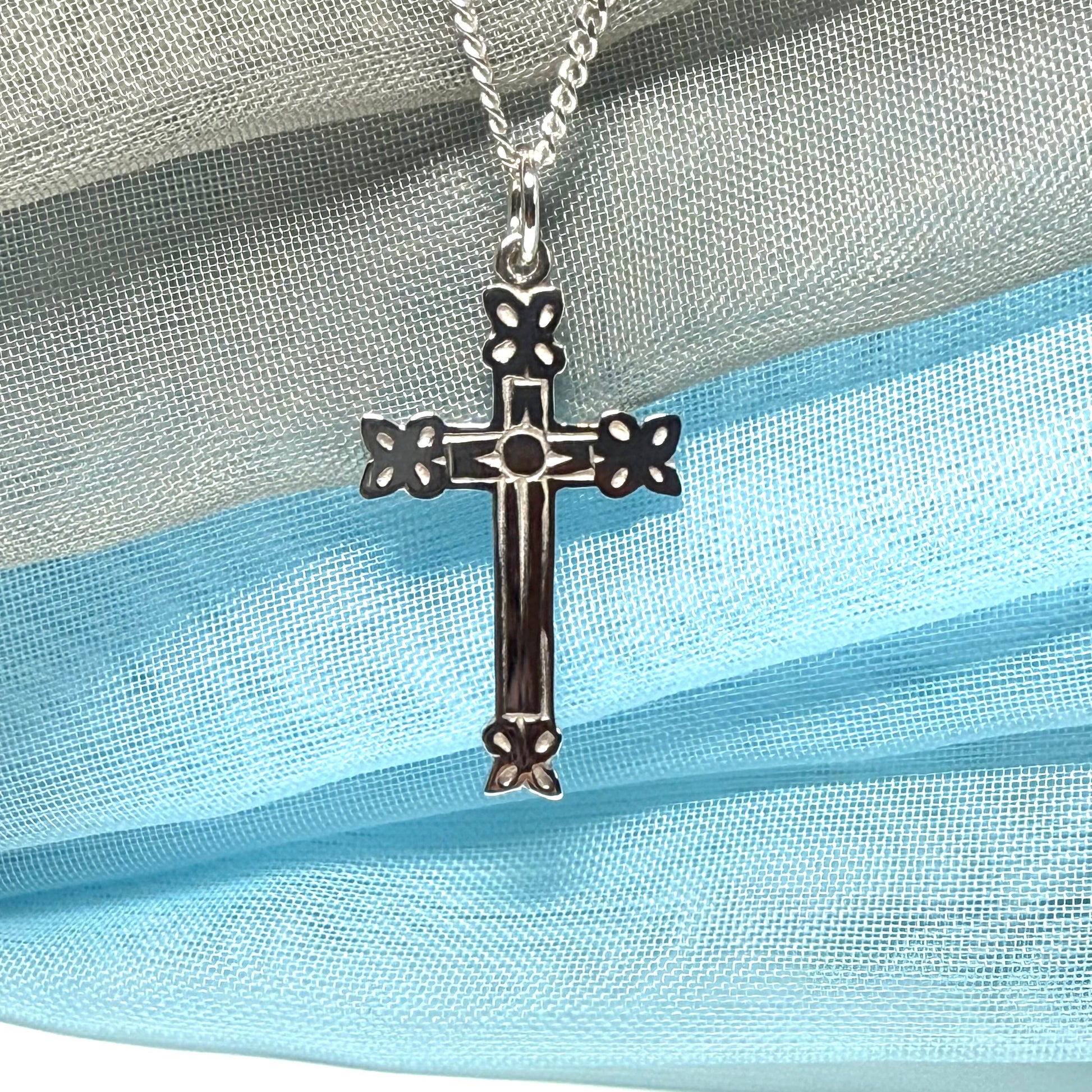 Sterling silver fancy solid patterned cross and chain