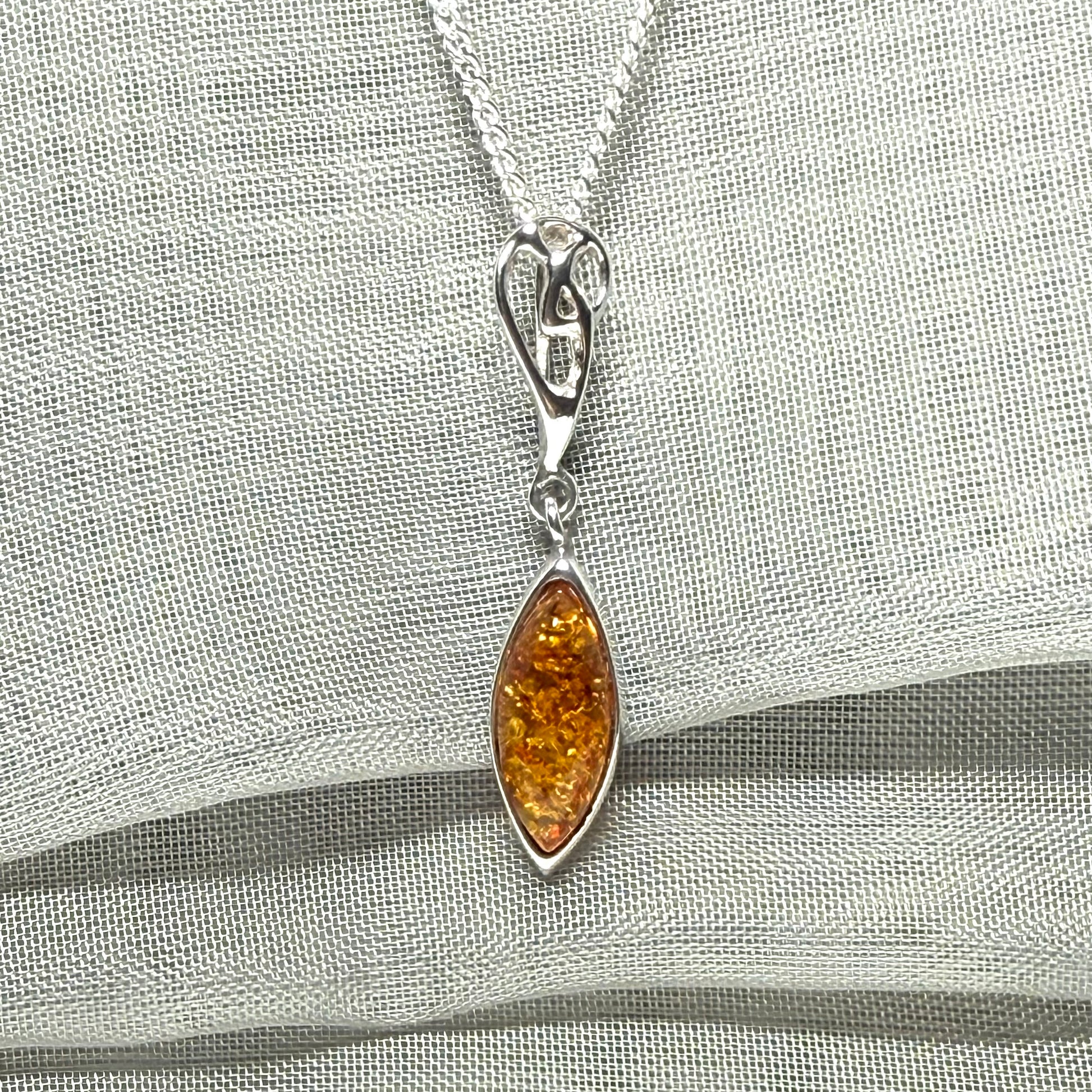 Sterling silver real amber marquise shaped necklace swirled open swirl pendant
