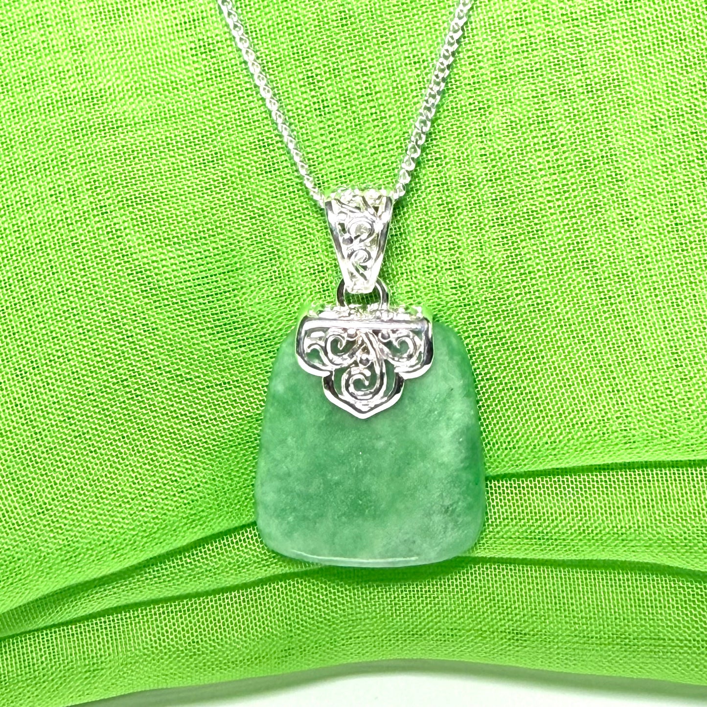 A Stunning real jade necklace green sterling silver large cushion shaped, a really gorgeous design