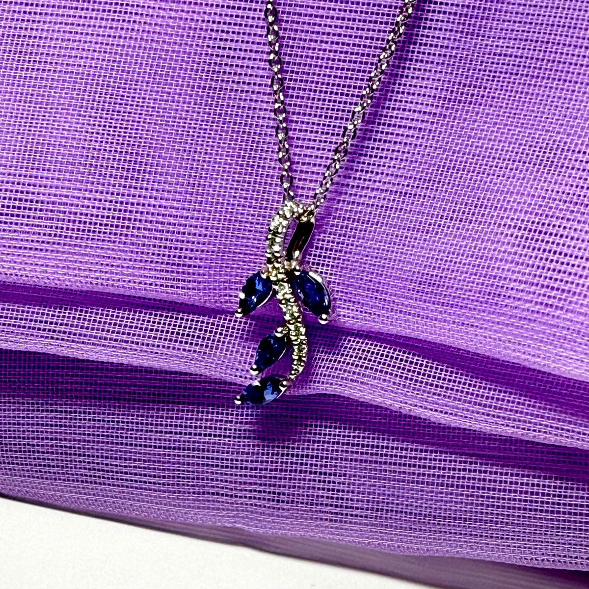 Tanzanite and diamond white Gold fancy spray necklace