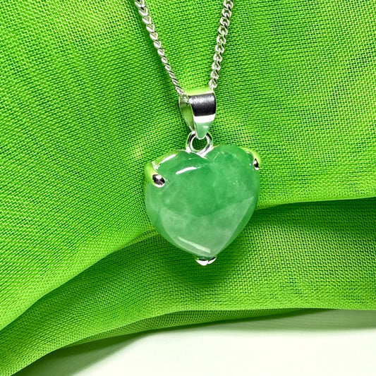 A beautiful and stunning real green jade necklace heart shaped sterling silver pendant