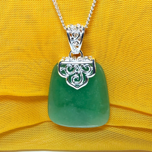 A beautiful and stunning real green jade necklace large pendant that is cushion in shape