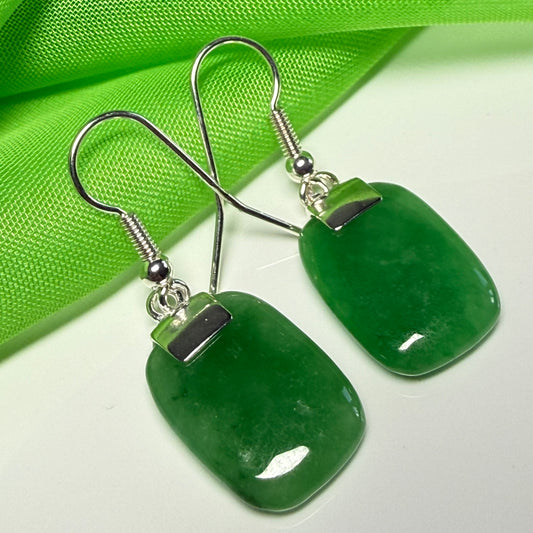 A beautiful pair of real green jade silver cushion shaped dropped earrings