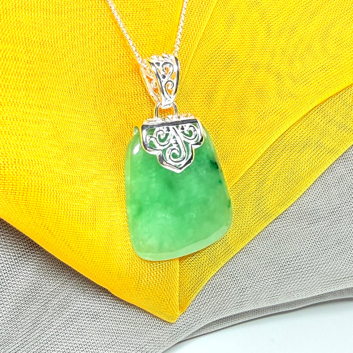 A beautiful real green jade necklace large pendant that is cushion in shape, stunning and irresistible