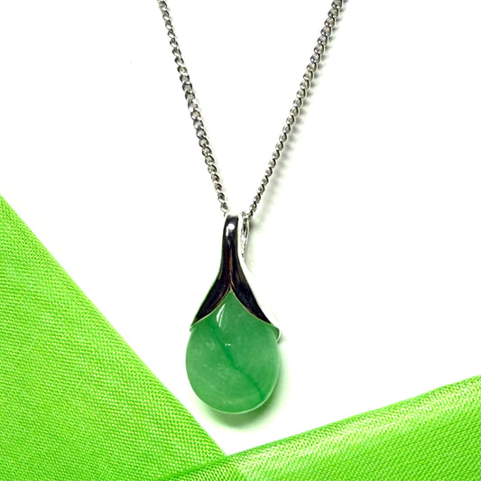 A beautiful real green jade necklace teardrop with a pear shaped pendant, a distinctive design
