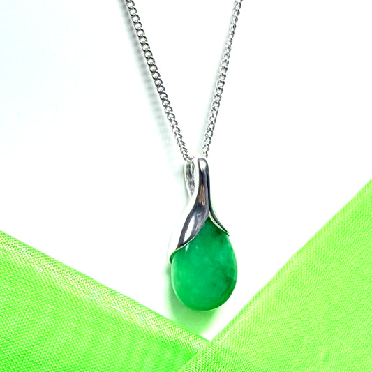A beautiful real green jade necklace with a teardrop pendant pear shape solid curb chain included with it