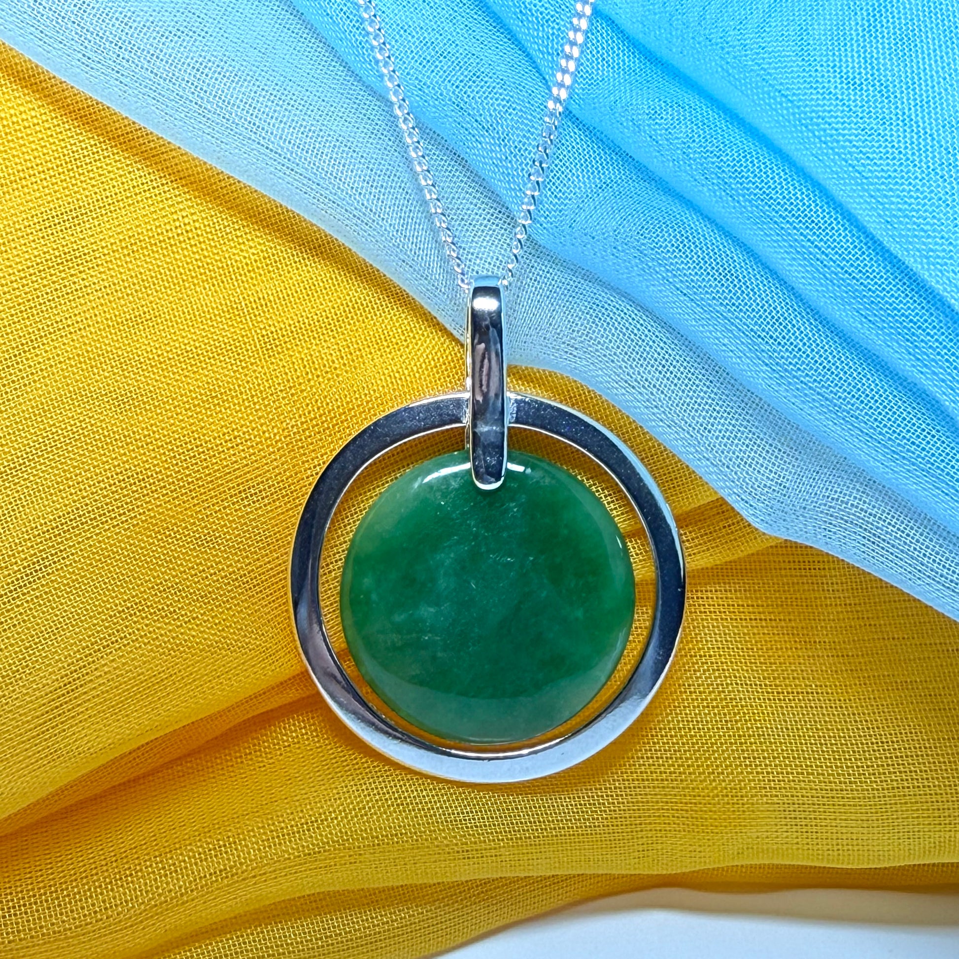 Large sterling silver round shaped green real jade necklace halo style, a stunning and timeless pendant design