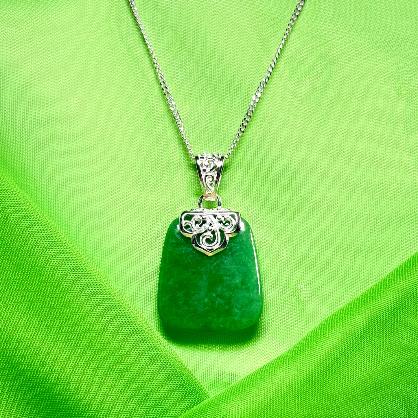 Necklace with a real green jade stone, large necklace cushion shaped, a timeless designed pendant