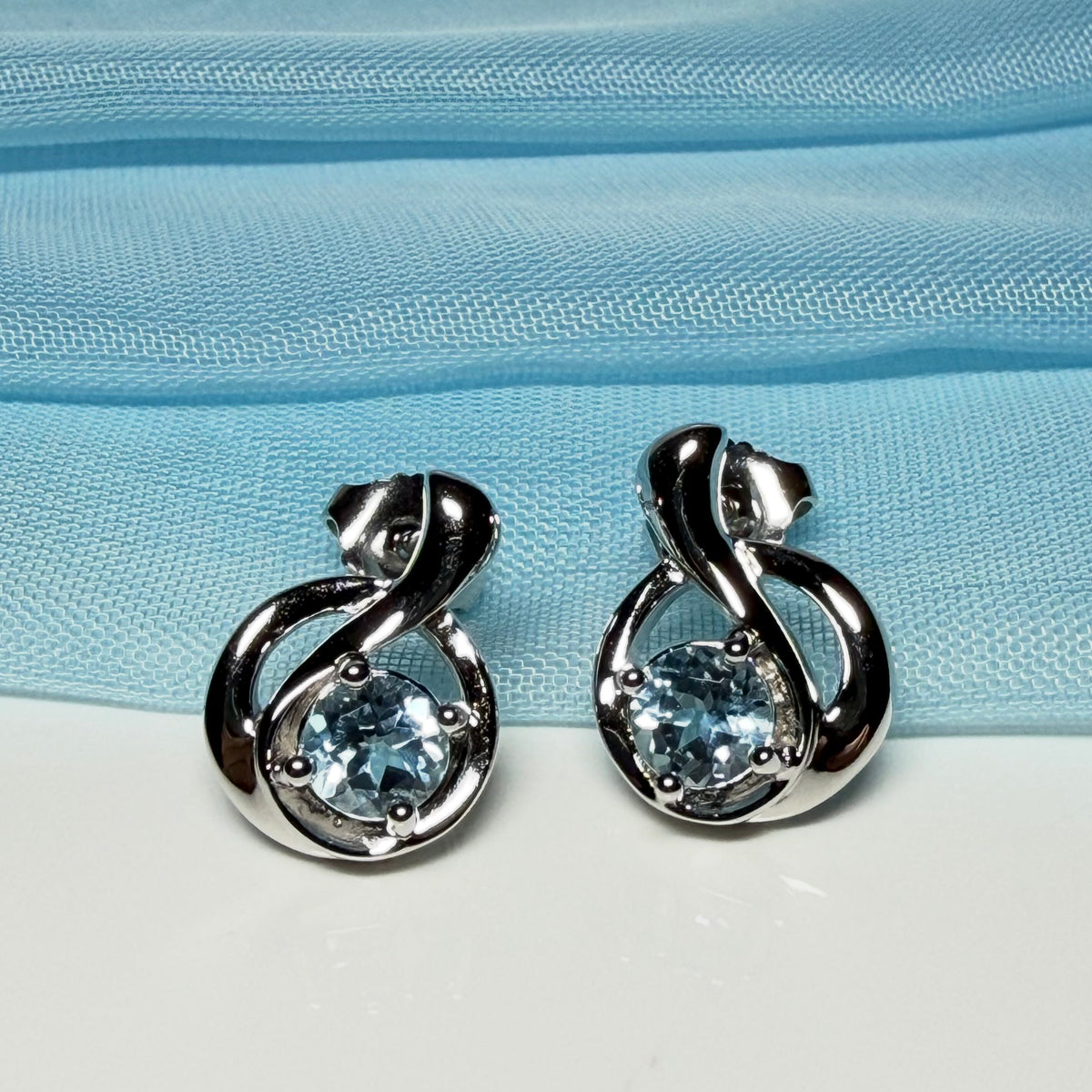 Pair of Real blue topaz stud drop earrings fancy round twisted swirl designed