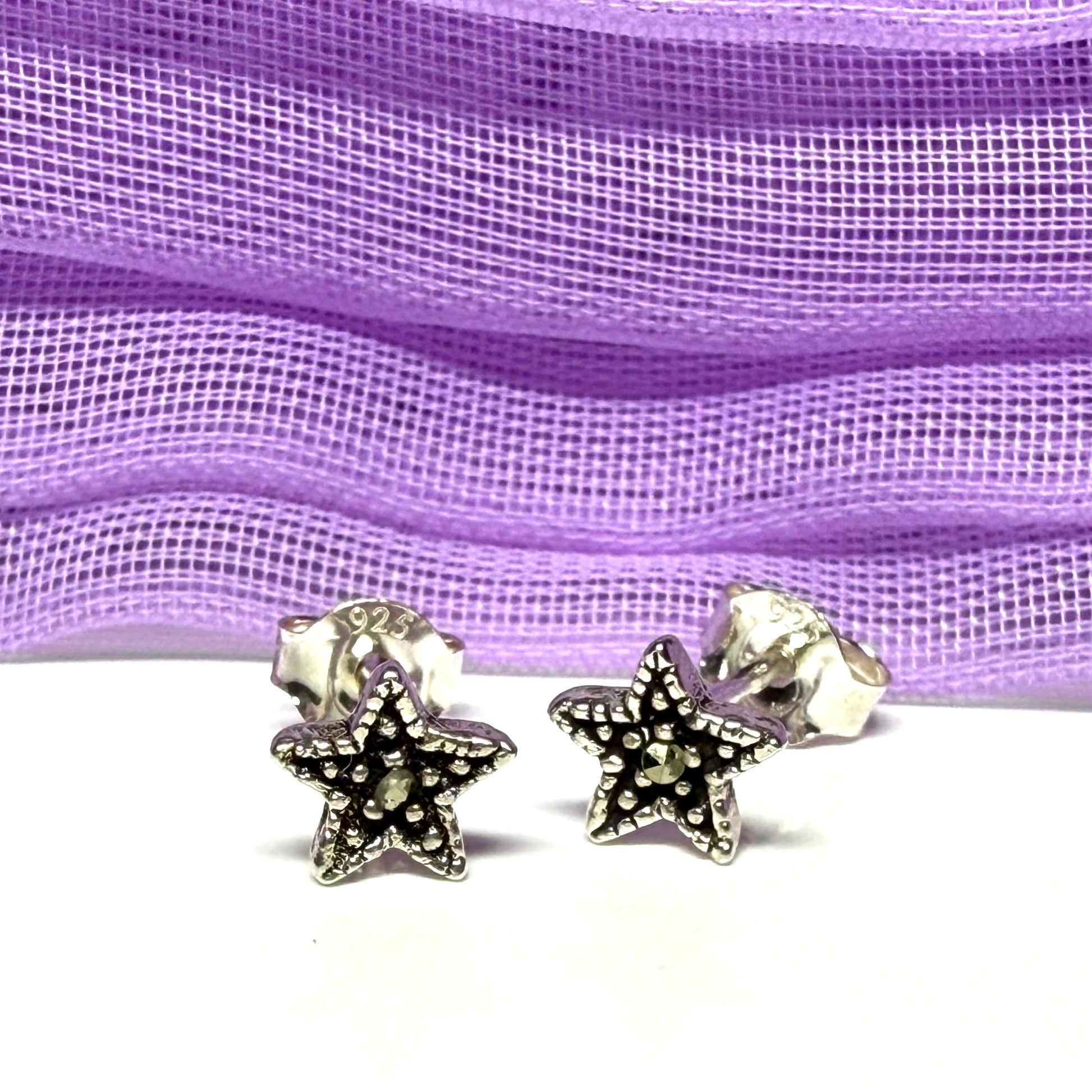 Pair of Small marcasite stud earrings star sterling silver