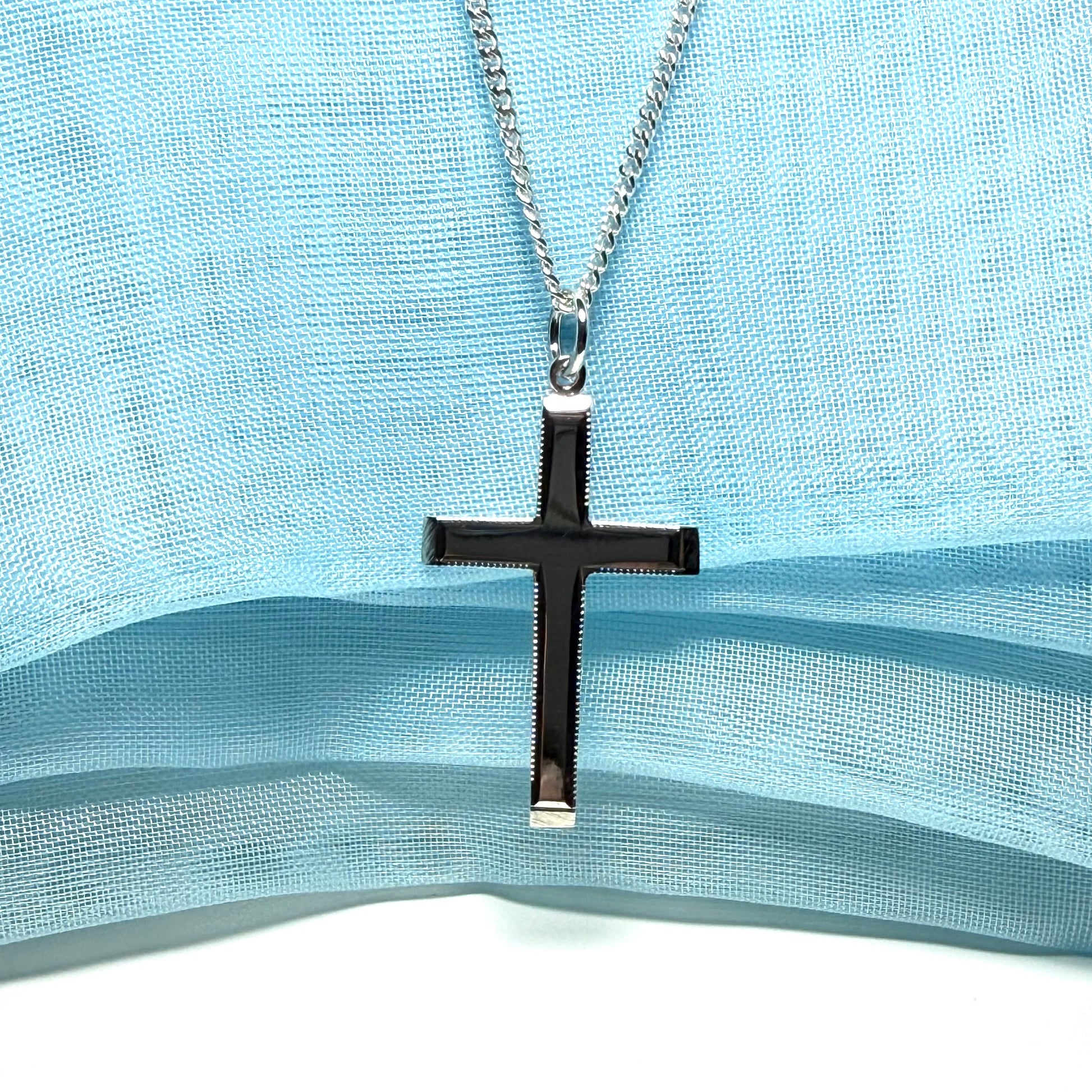 Polished beaded edge solid sterling silver cross including chain