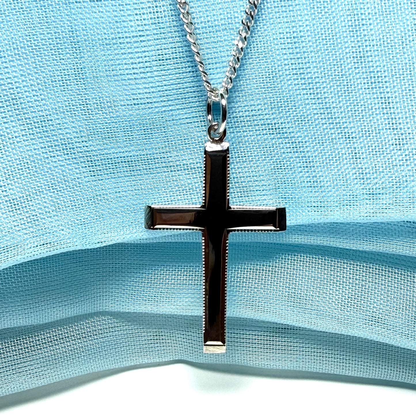 Polished beaded edge solid sterling silver cross including chain