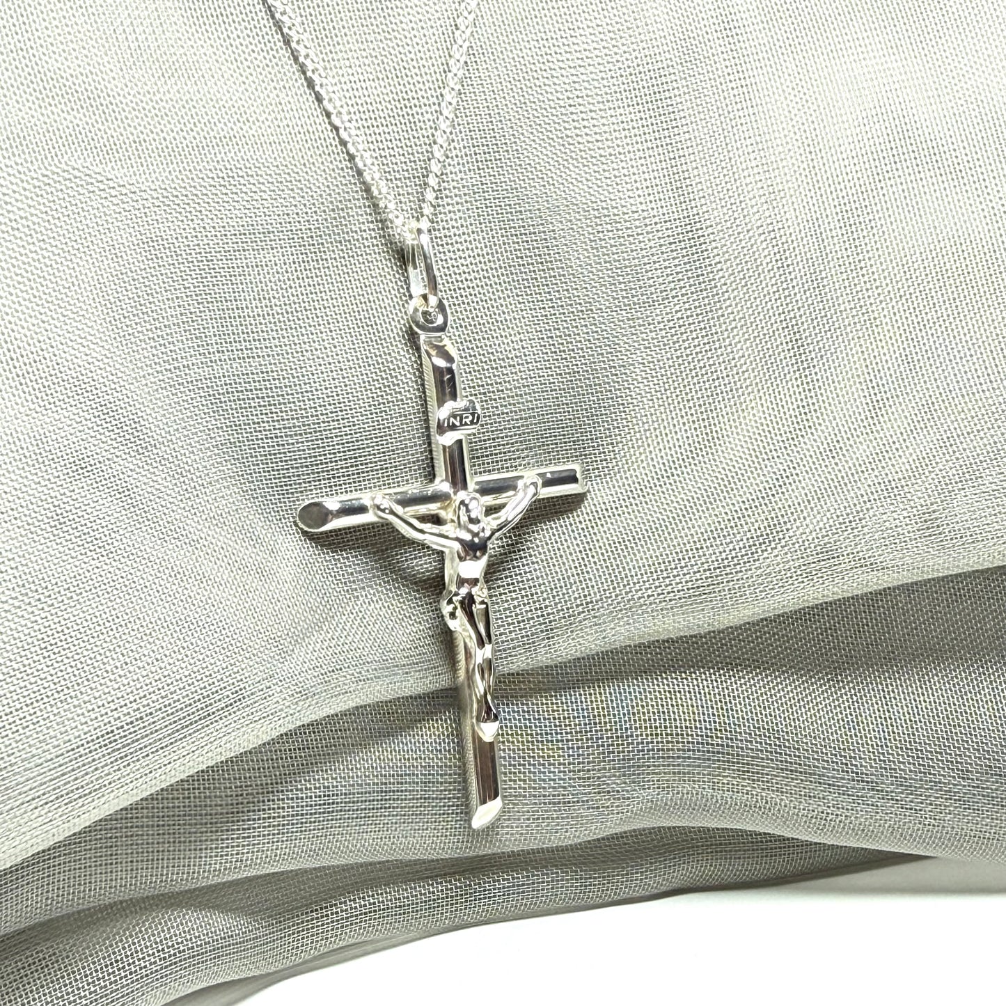 Polished sterling silver crucifix cross necklace including chain
