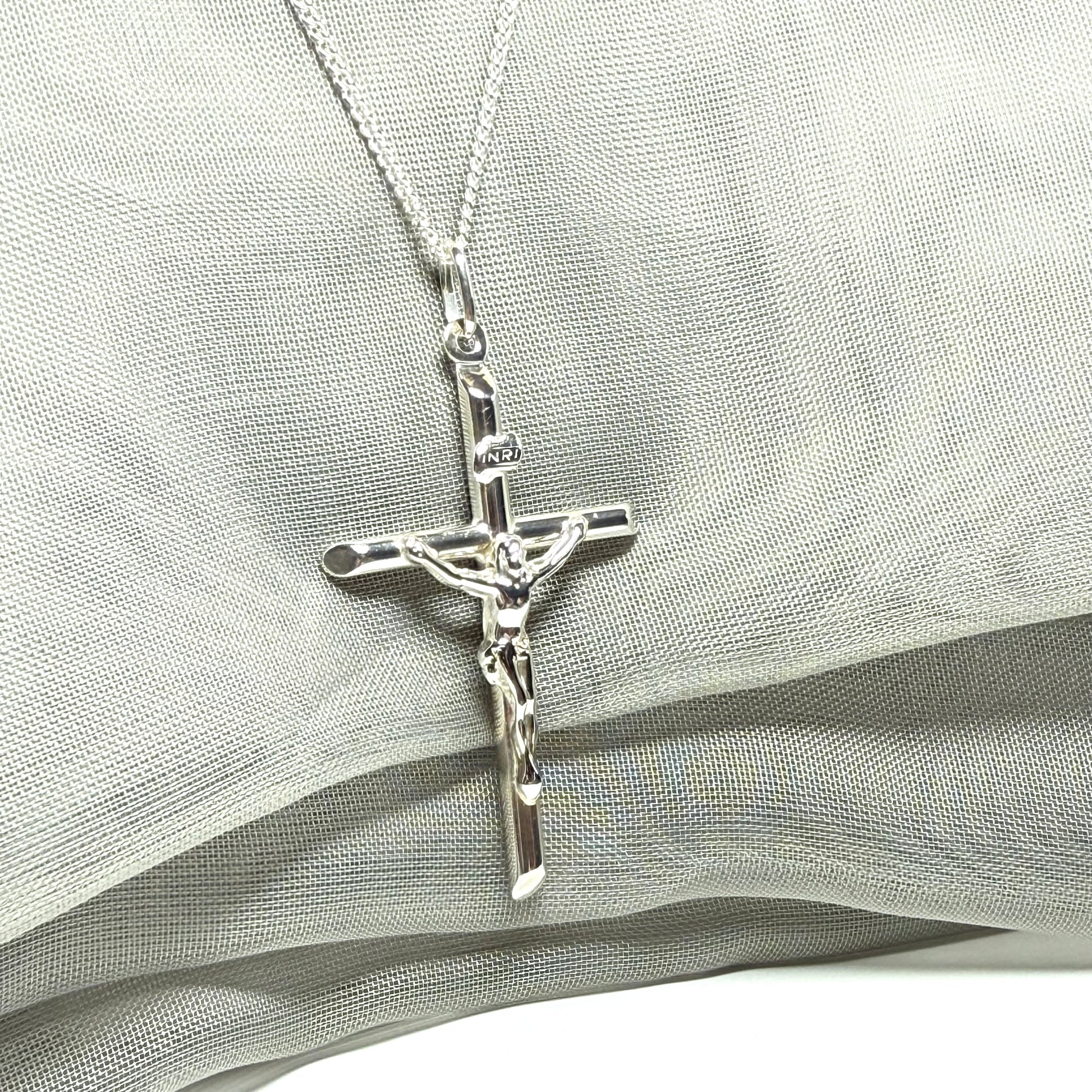 Polished sterling silver crucifix cross necklace including chain