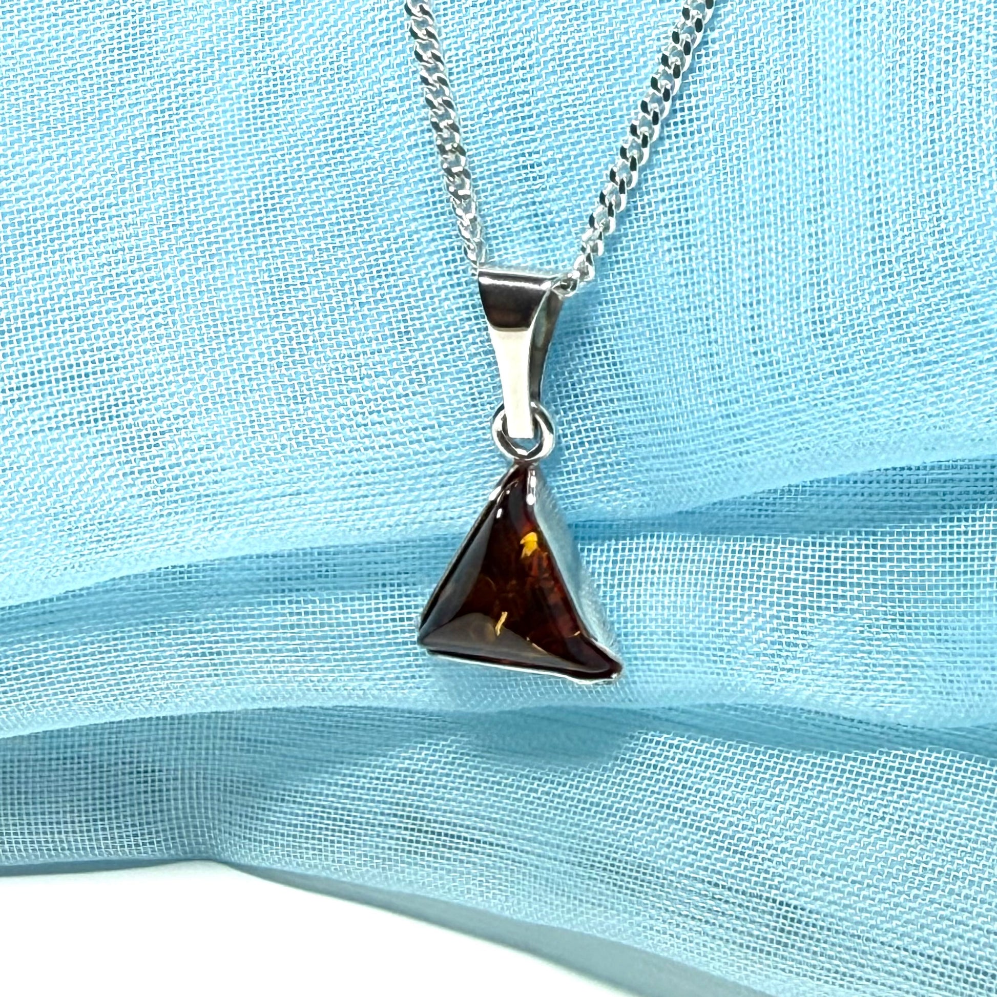 A real amber necklace sterling silver triangle shape dark amber pendant