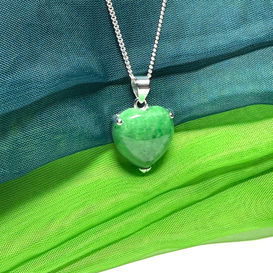 A real dark green jade pendant necklace heart shape sterling silver and a chain