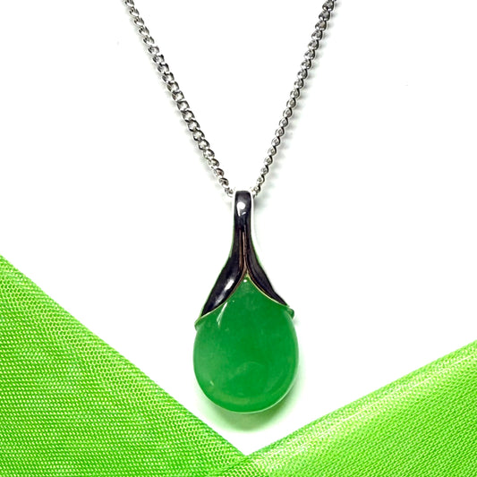 A real green jade distinctive necklace in a teardrop shaped or pear shape