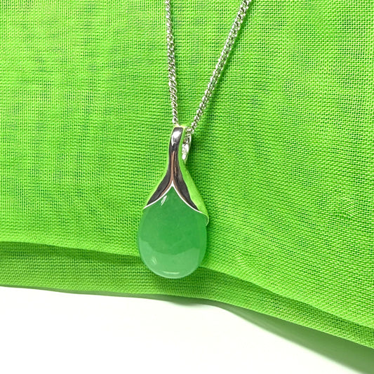 A real green jade distinctive necklace in a teardrop shaped or pear shape