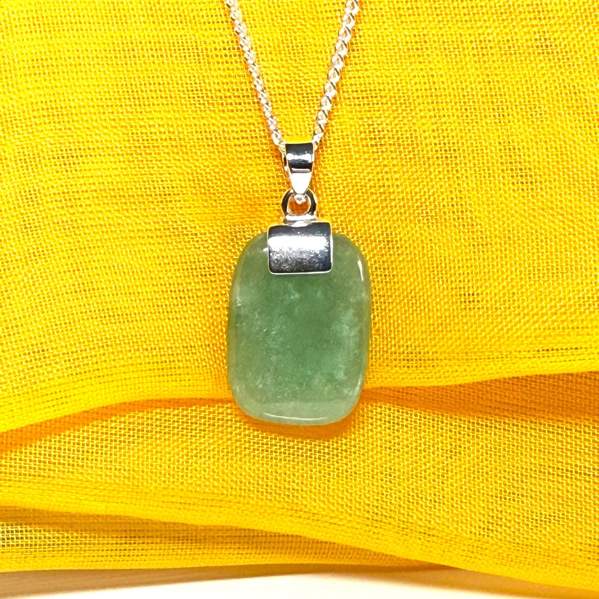 A real green jade necklace cushion shape stone sterling silver chain included losange shaped pendant