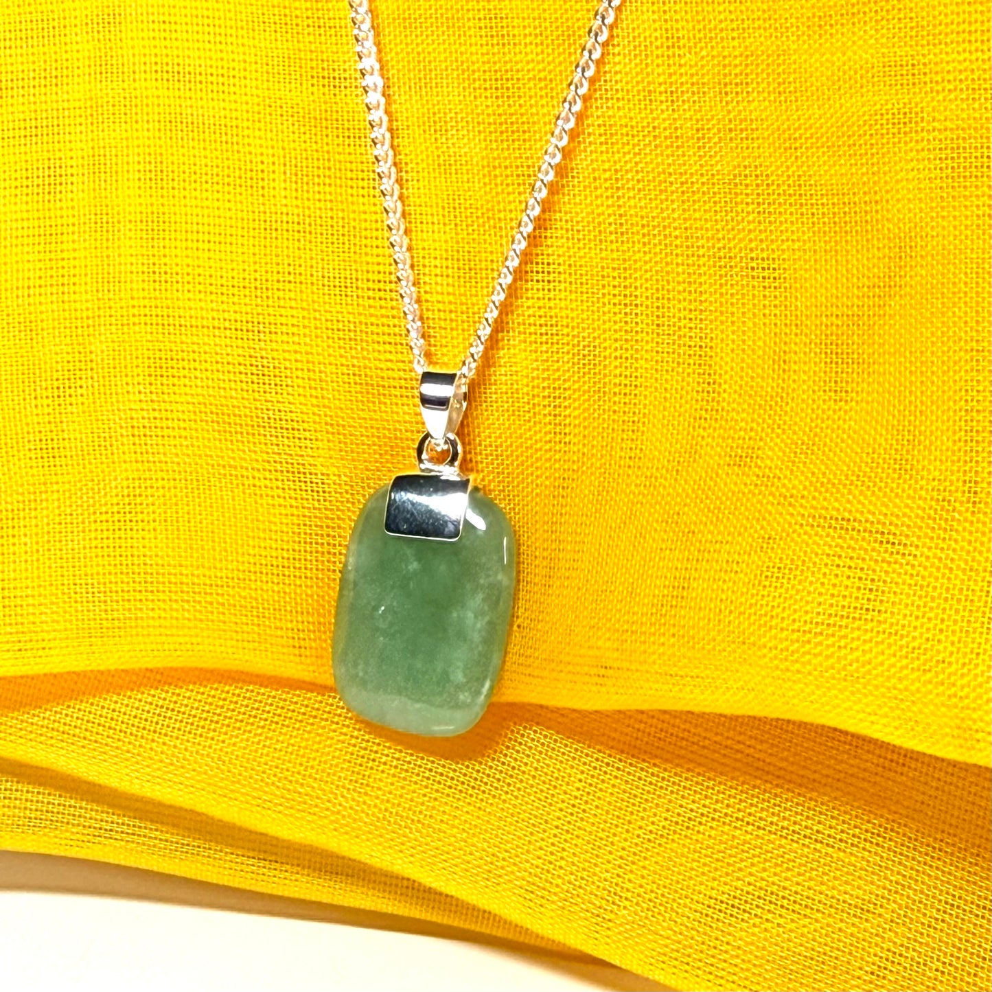A real green jade necklace cushion shape stone sterling silver chain included losange shaped pendant