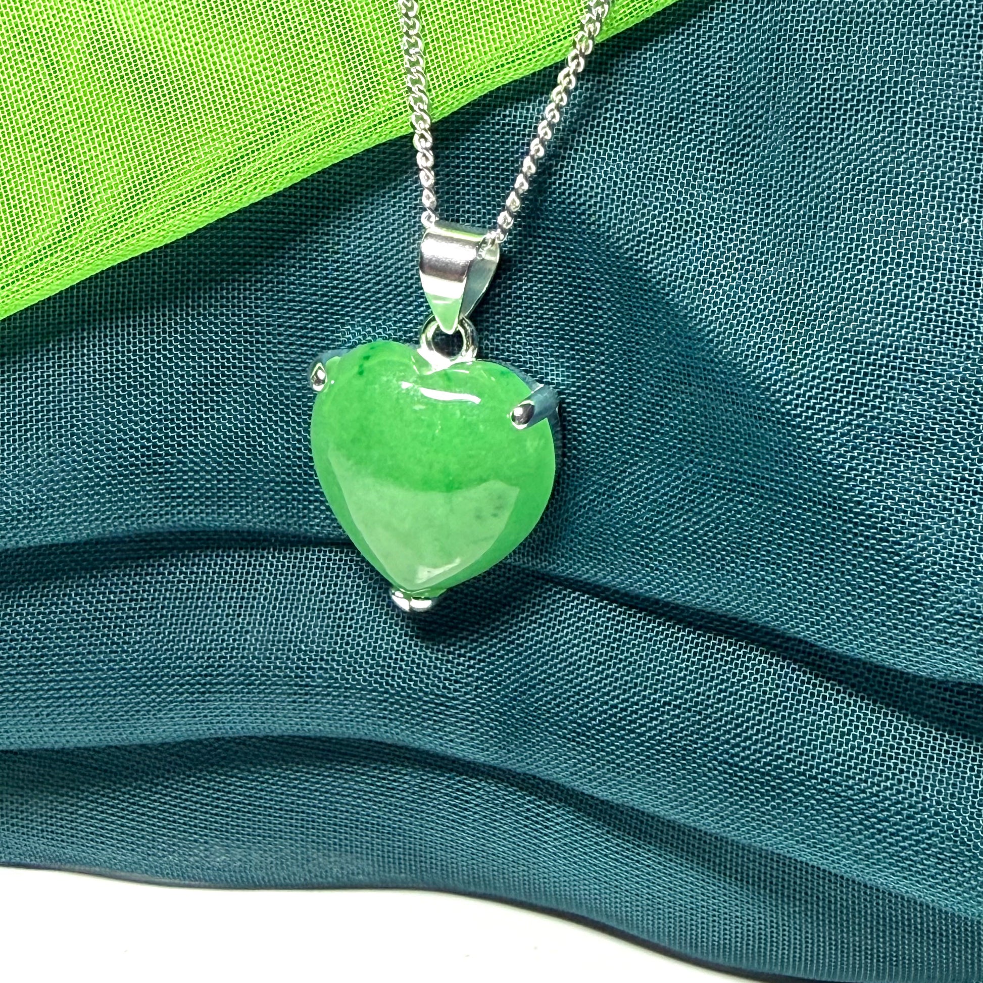 A real green jade necklace heart shape sterling silver, a timeless pendant and chain
