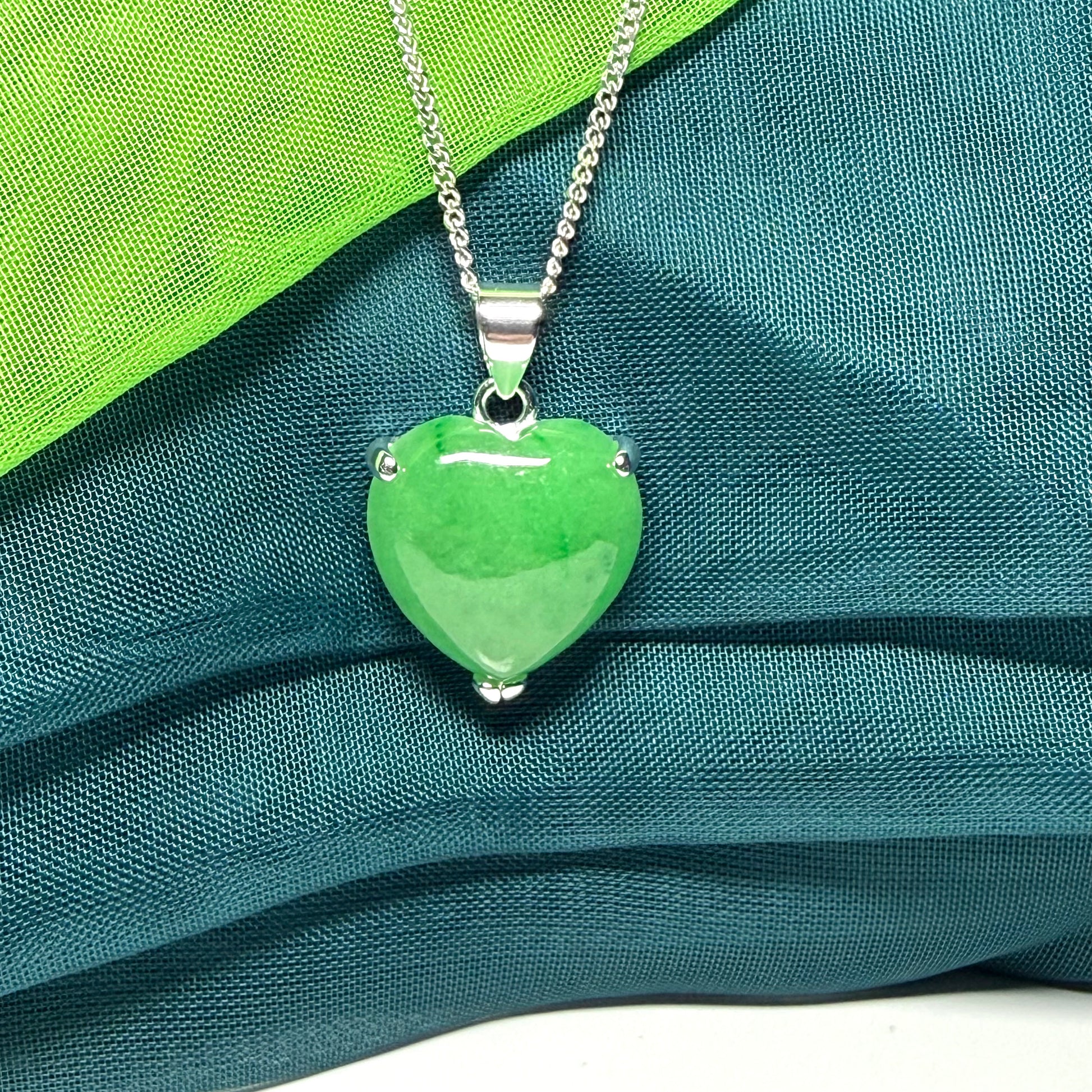 A real green jade necklace heart shape sterling silver, a timeless pendant and chain