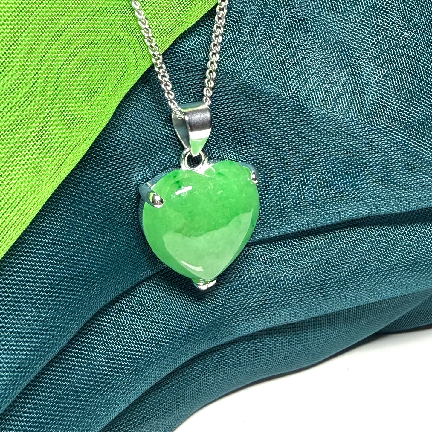 A real green jade necklace heart shape sterling silver, a timeless pendant and chain