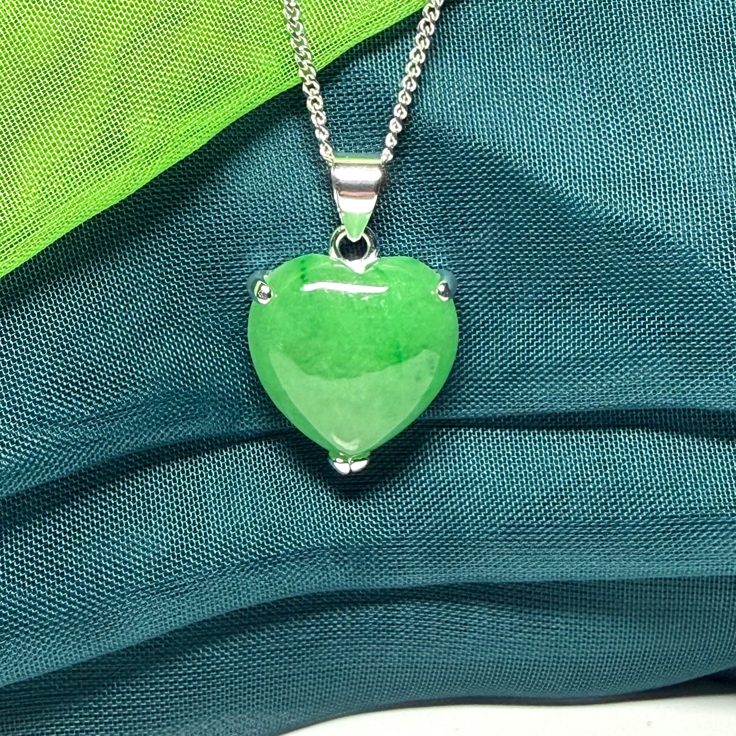 A real green jade necklace heart shape sterling silver, a timeless pendant and chain