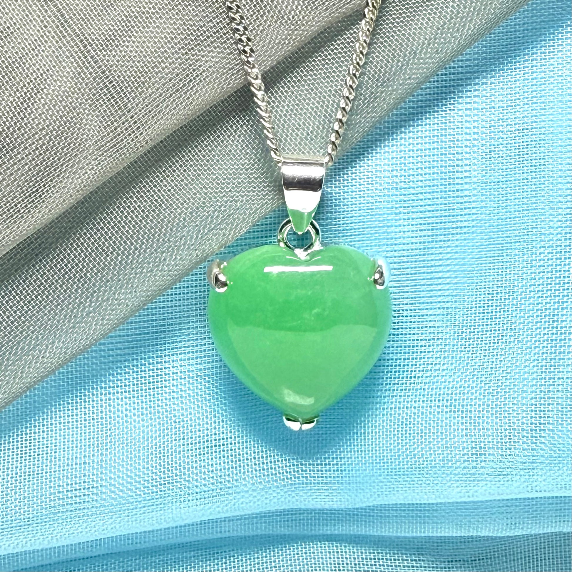 A real green jade necklace heart shaped sterling silver with chain