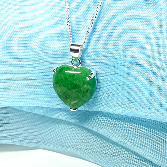 A real green jade necklace heart shape sterling silver with solid chain and box included as well