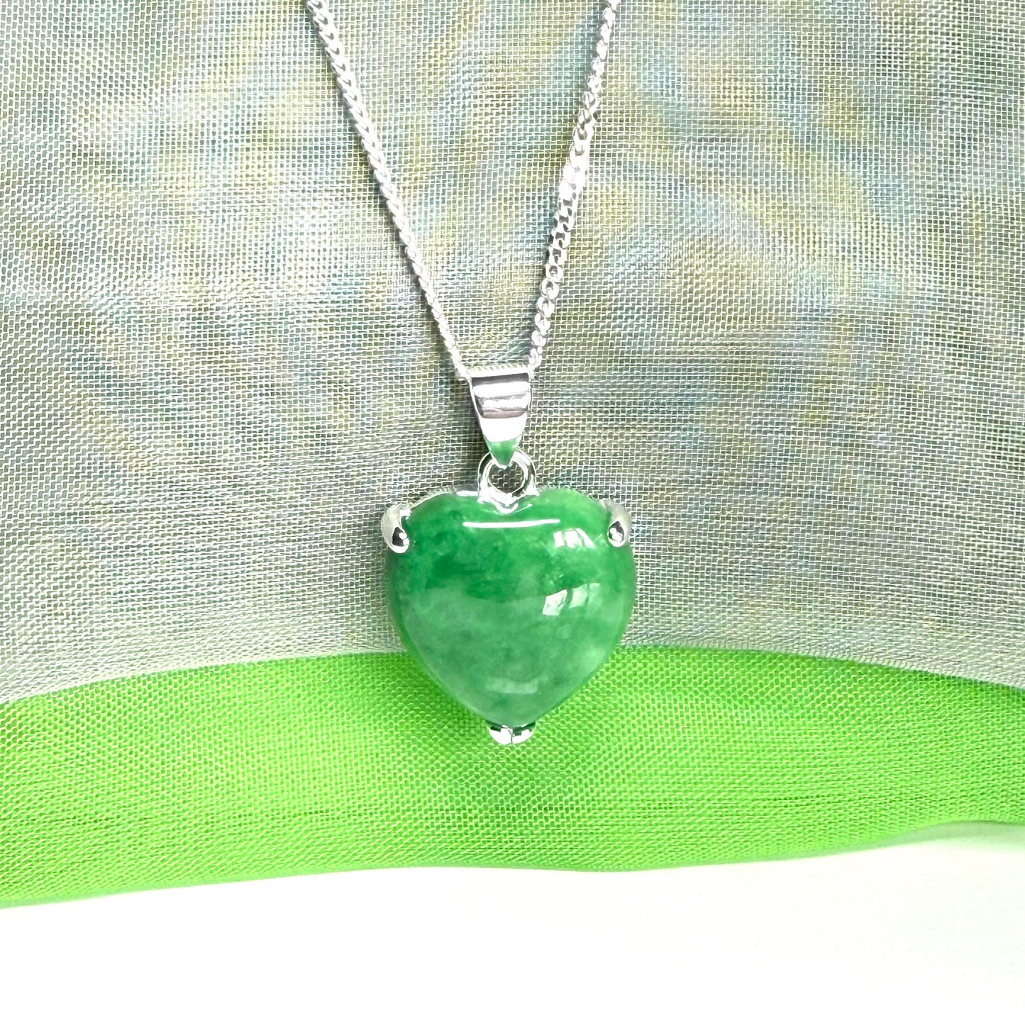 A real green jade necklace heart shape sterling silver with solid chain and box included