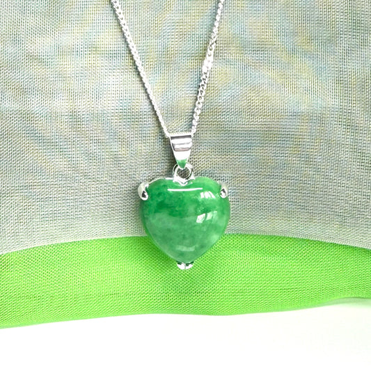 A real green jade necklace heart shape sterling silver with solid chain and box included