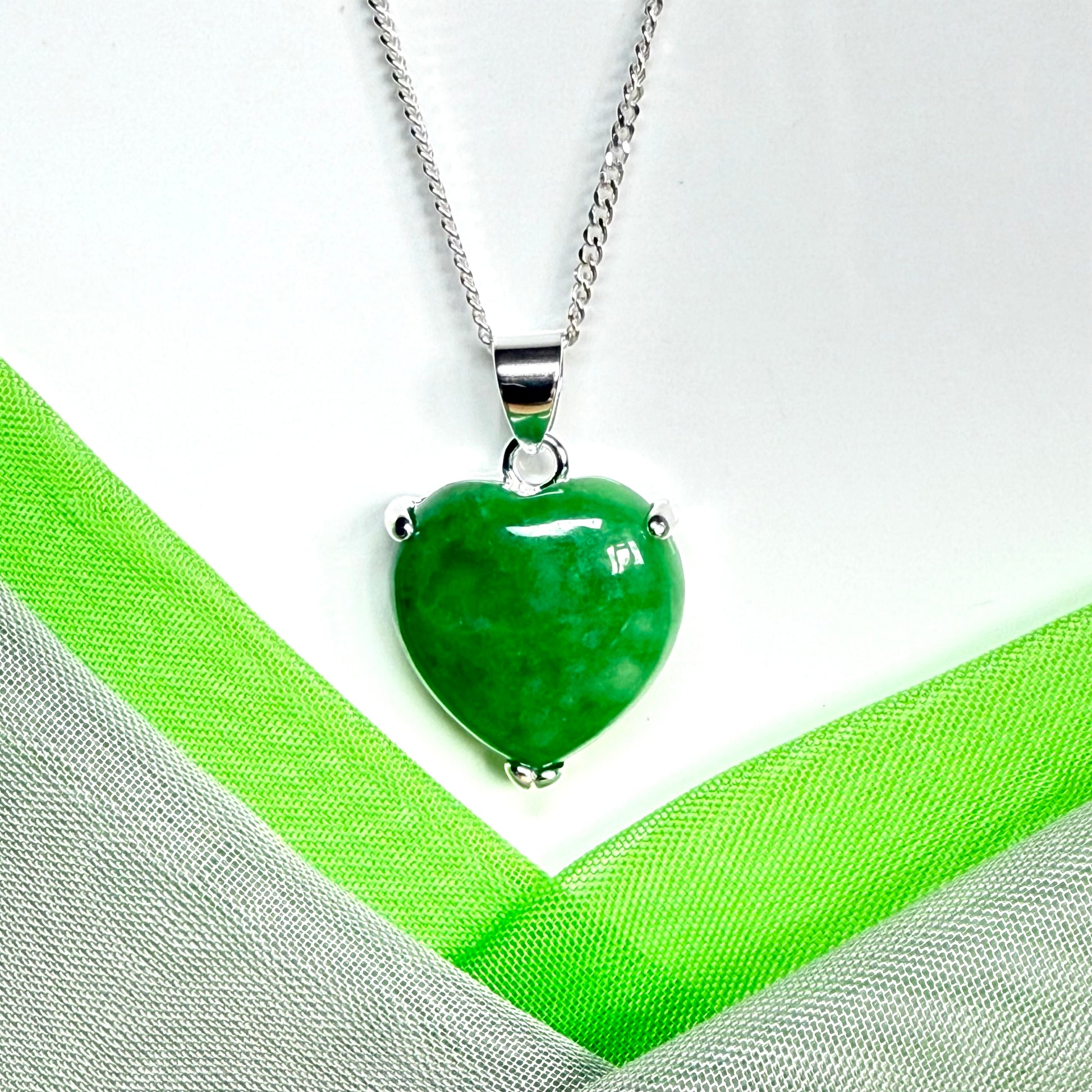 A real green jade necklace heart shape sterling silver with solid chain and box included
