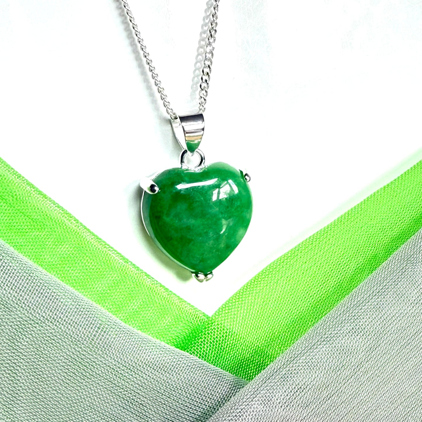 A real green jade necklace heart shape sterling silver with solid chain and box included