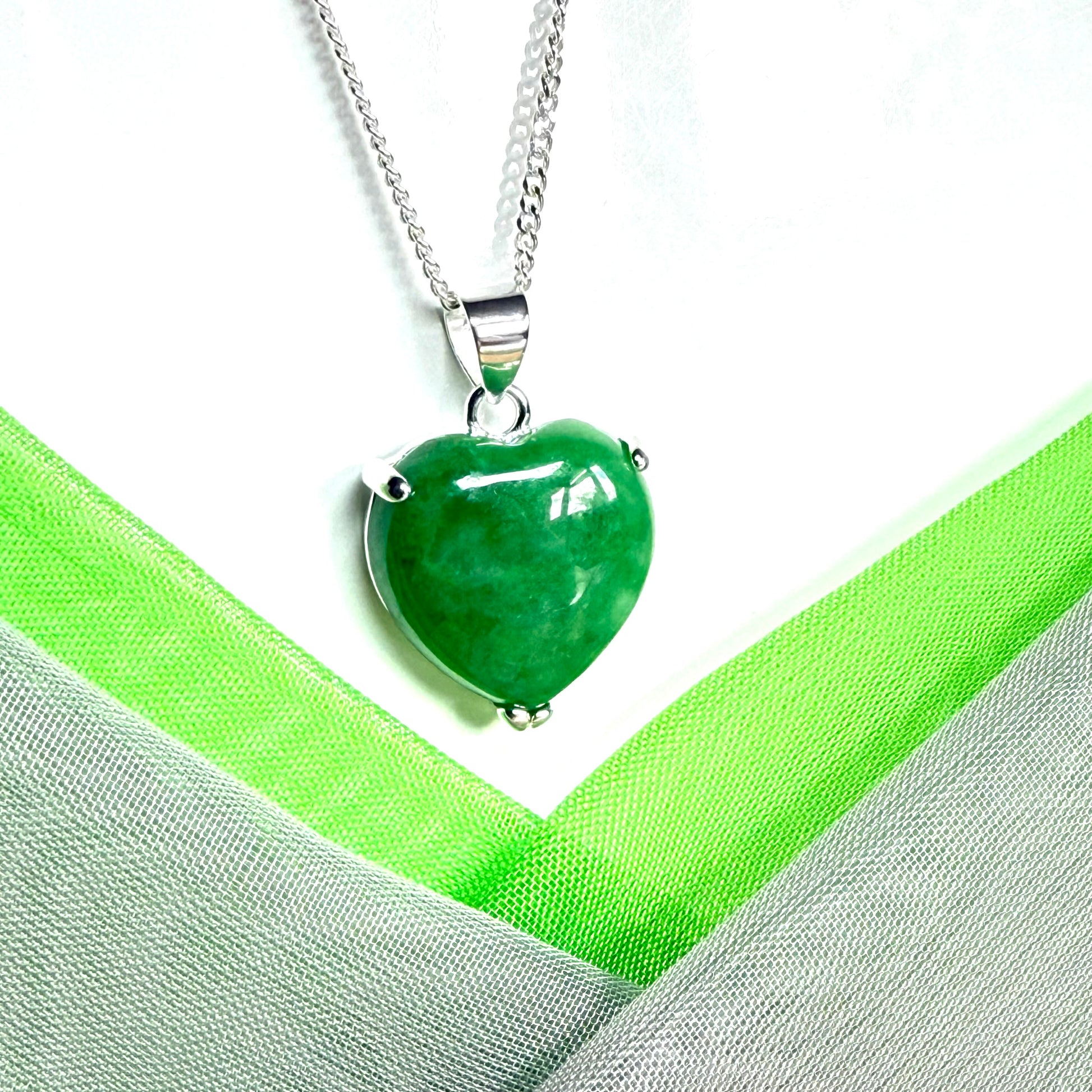A real green jade necklace heart shape sterling silver with solid chain and box included