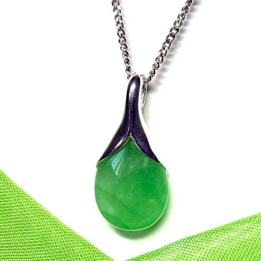 A real green jade necklace in a pear shaped pendant drop