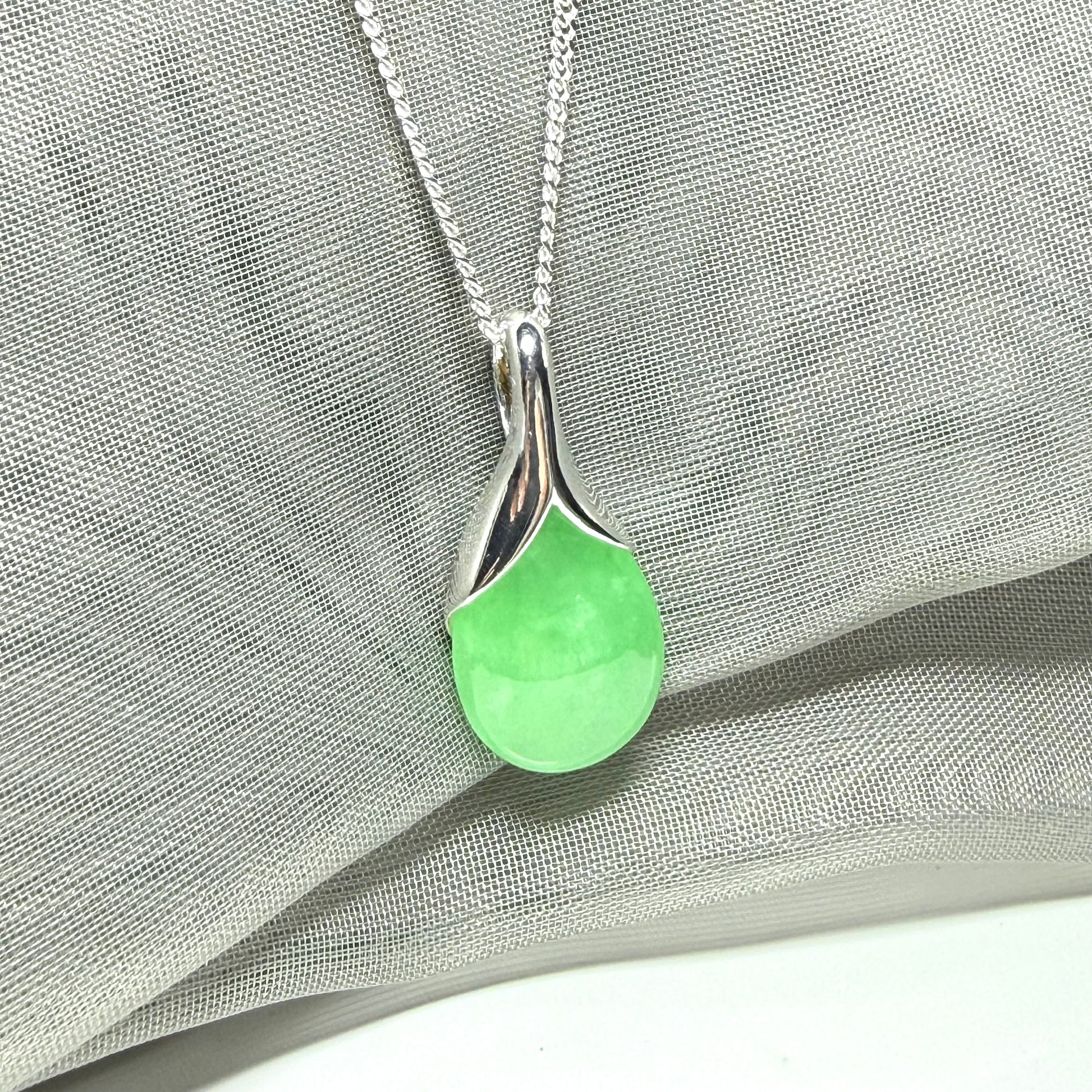 Real green jade necklace in a teardrop or pear shaped, a simply stunning pendant