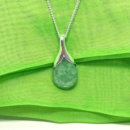 A real green jade necklace in a teardrop or pear shaped, timeless designed pendant
