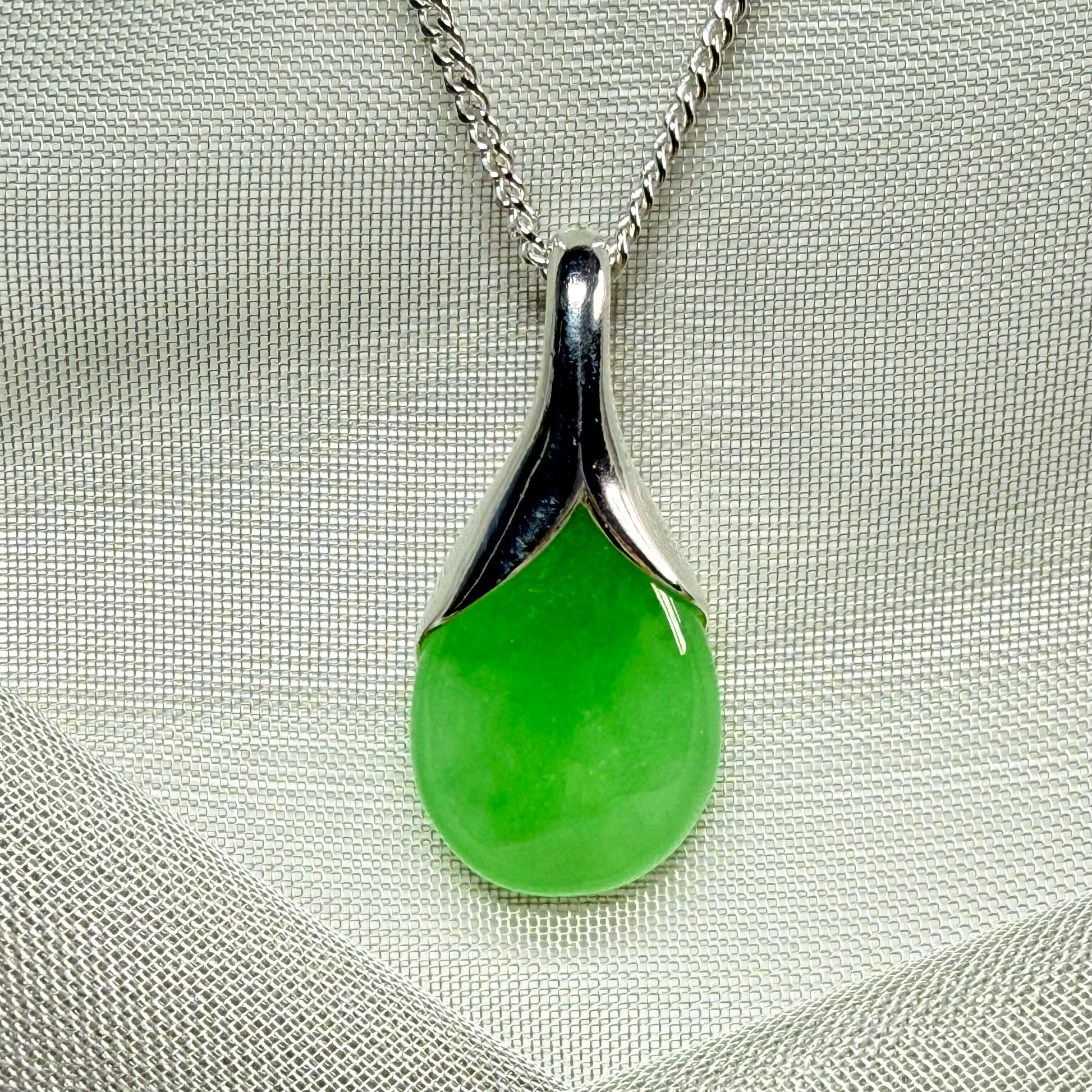 Real green jade necklace in a teardrop or pear shaped, timeless designed pendant solid chain