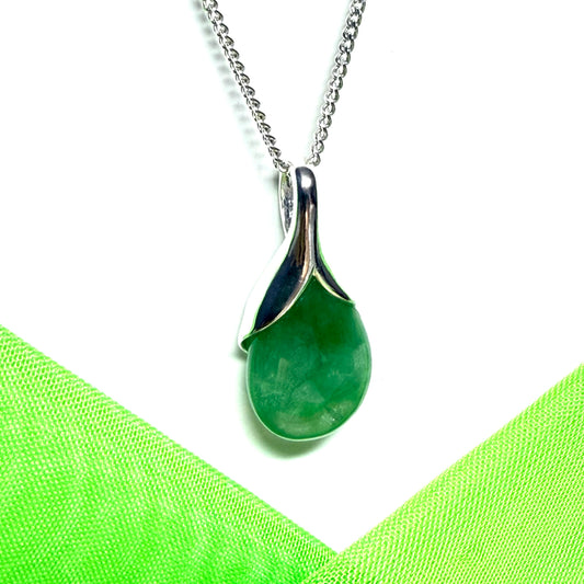 A real green jade necklace teardrop with a pear shaped pendant, with chain included