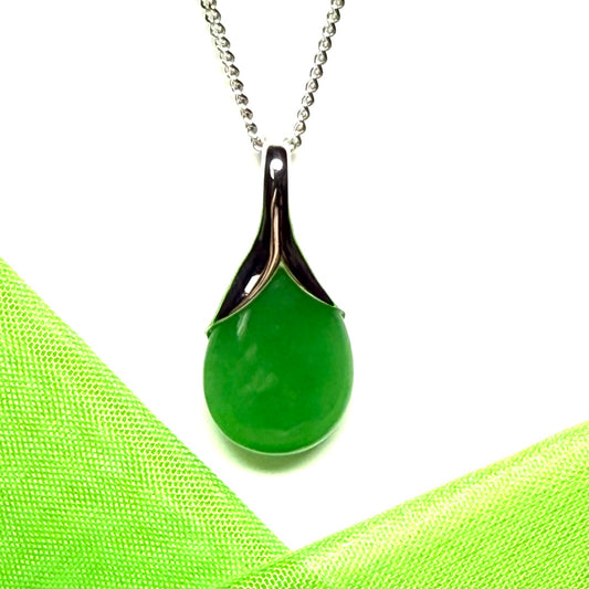 A real green jade pear shaped necklace in a teardrop pendant with a chain included