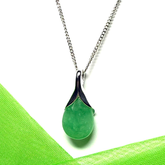 A real green jade pear shaped necklace in a teardrop pendant including a chain