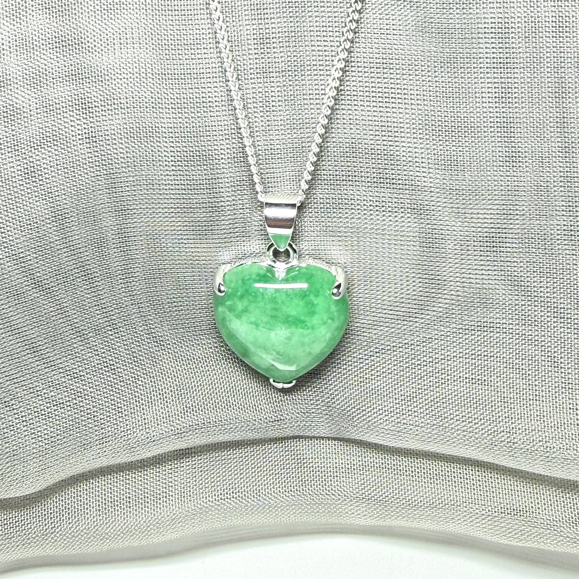 A real green jade pendant heart shaped sterling silver, a gorgeous designed necklace with chain included