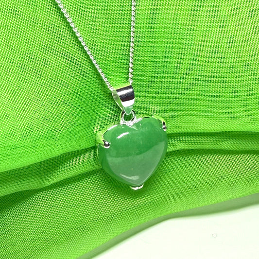 A real green jade pendant heart shaped sterling silver, a traditionally designed necklace