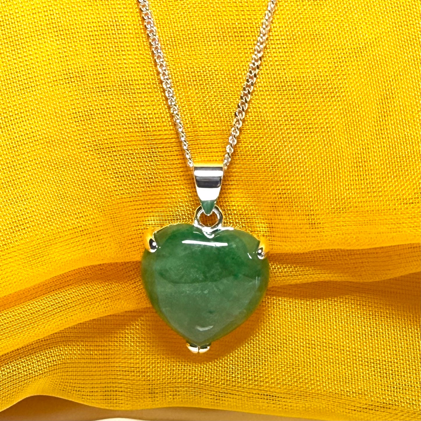 A real green jade pendant heart shaped sterling silver, an exquisite designed necklace