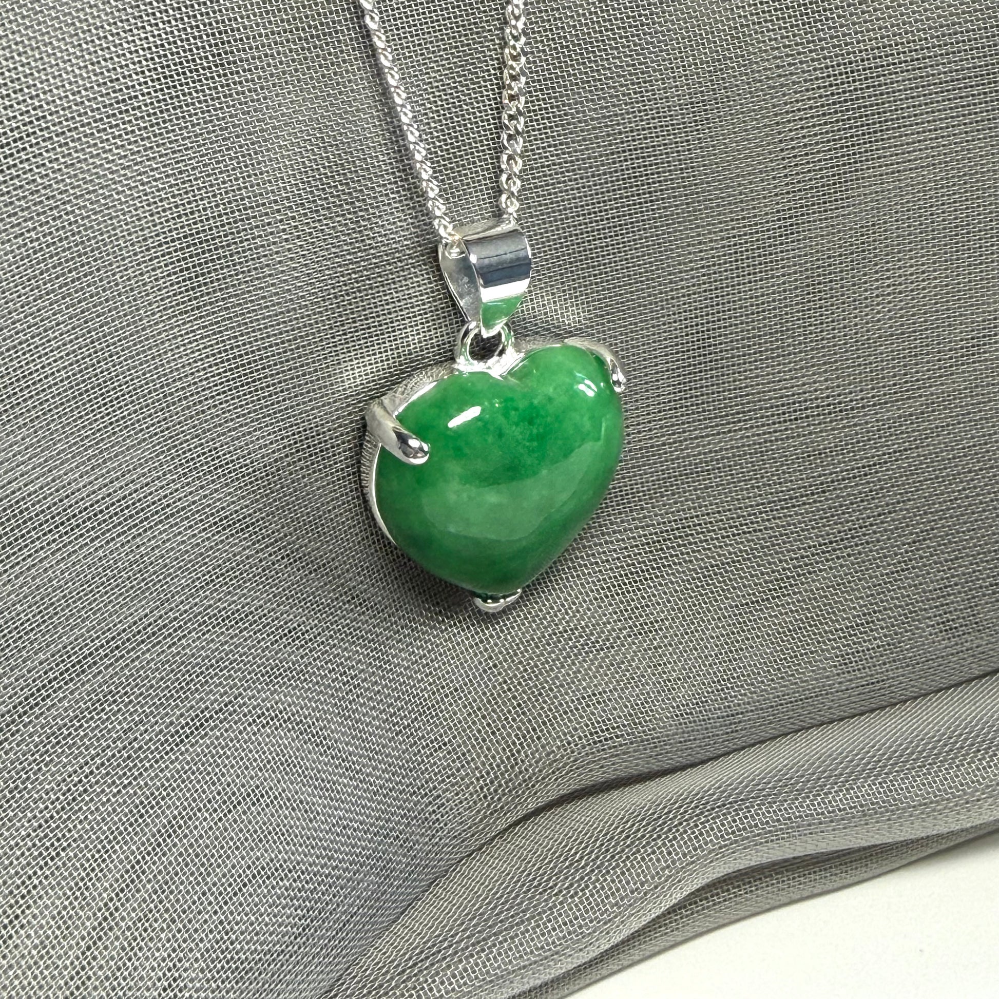 A real green jade pendant heart shaped sterling silver, a traditional designed necklace