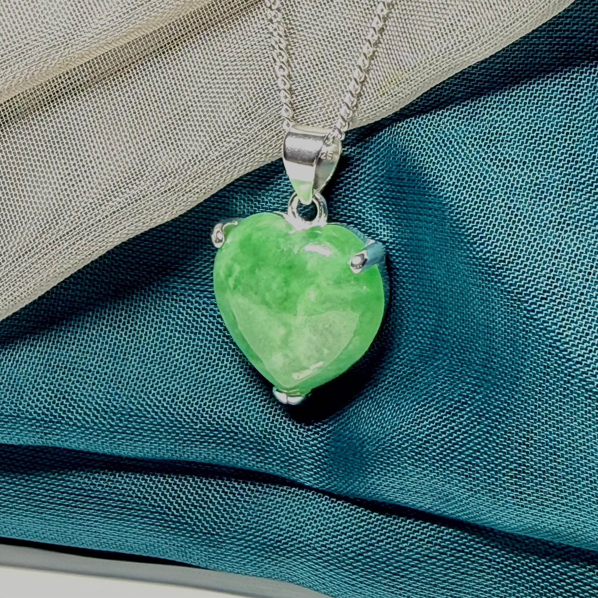 A real green jade pendant necklace heart shape sterling silver and chain
