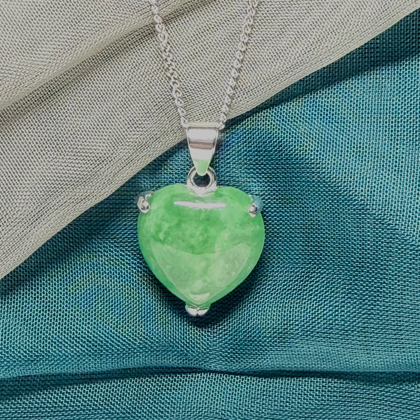 A real green jade pendant necklace heart shape sterling silver and chain